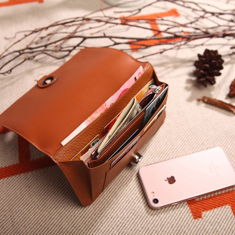 Premium cowhide leather wallet with luxurious lychee pattern design, featuring multiple compartments for secure storage and organisation.