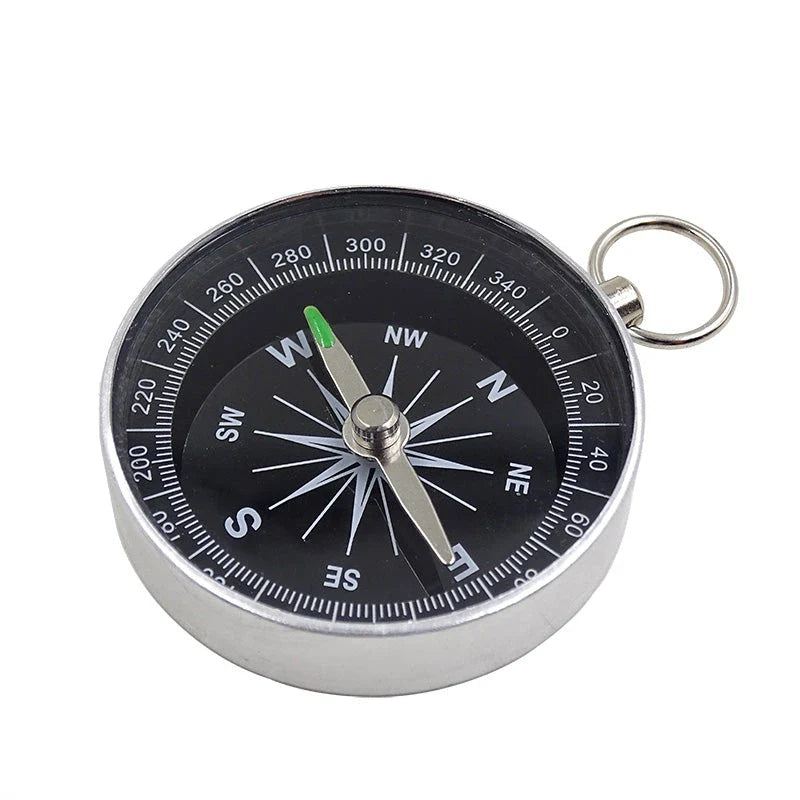 Compact aluminium compass keychain with tempered glass surface and bright compass face, perfect for outdoor adventures in the UK