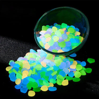 Enchanting glow-in-the-dark decorative pebbles illuminating a garden pathway at night