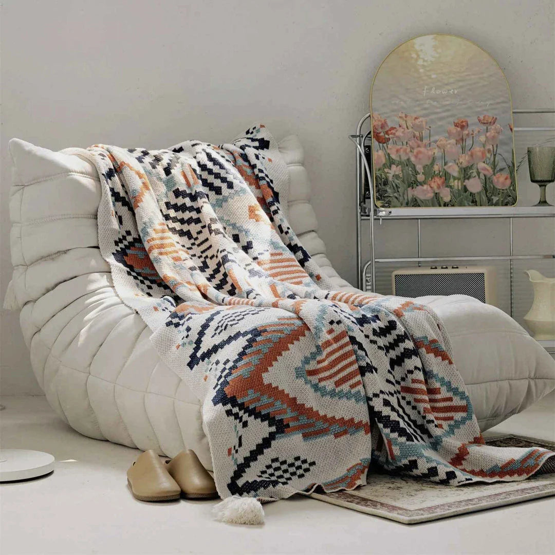 Boho geometric design cotton blanket in various sizes, perfect for indoor and outdoor use