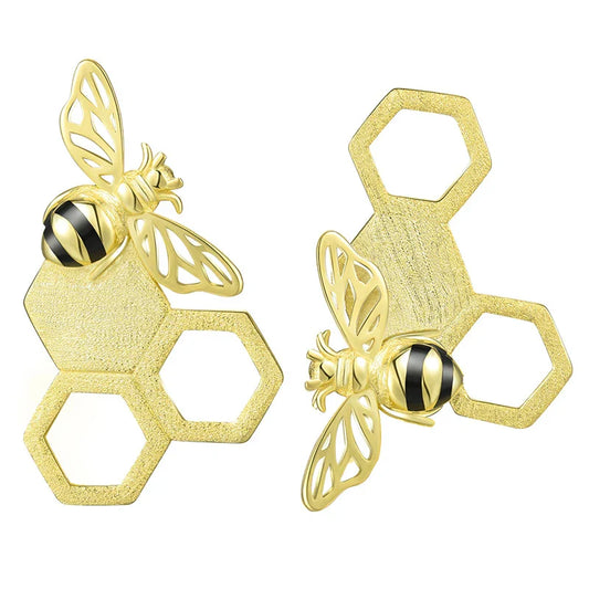 Elegant sterling silver beehive-inspired stud earrings with a nature-inspired design, perfect for fashion-conscious women