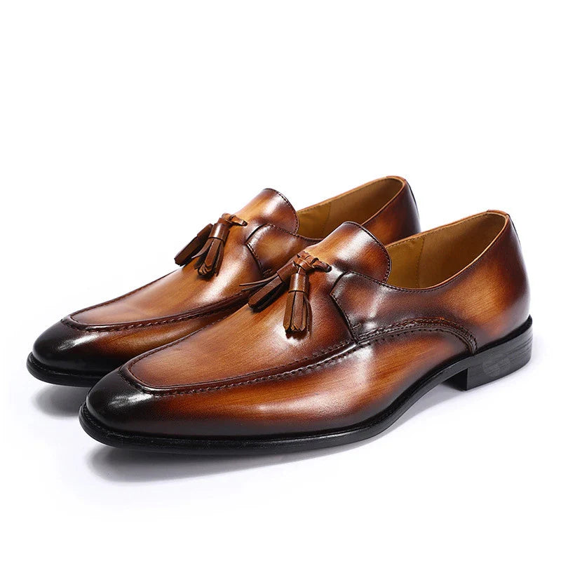Stylish and comfortable leather loafers for men, featuring a sleek design, premium cowhide, and rubber soles for exceptional grip and shock absorption.