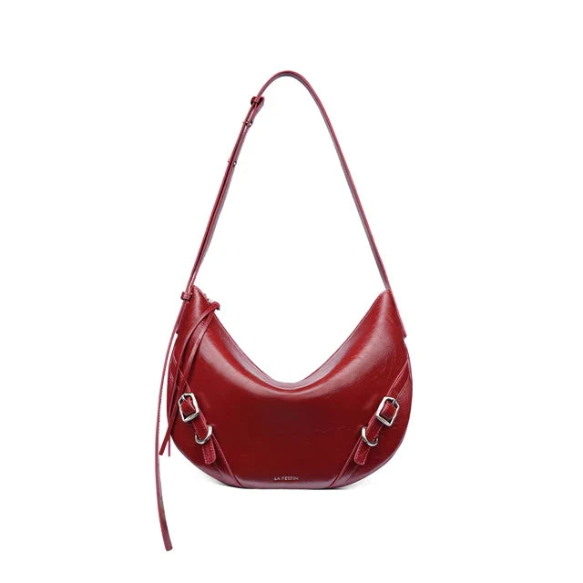 Elegant and versatile shoulder and crossbody bag in black, featuring a chic design, spacious compartments, and premium leather construction.