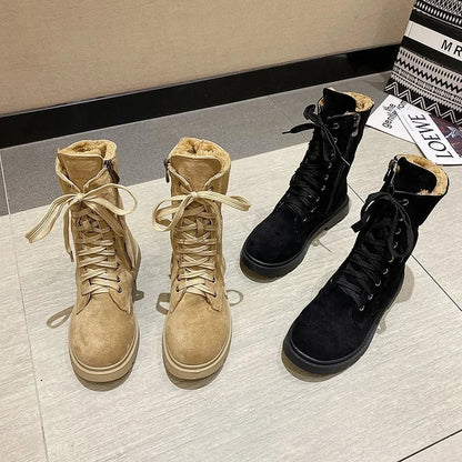 A pair of stylish British retro boots with a durable rubber sole and a cloth upper, perfect for fashionable female students.