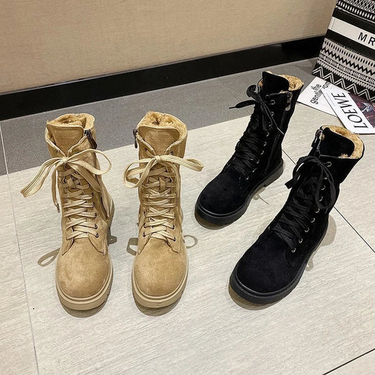 A pair of stylish British retro boots with a durable rubber sole and a cloth upper, perfect for fashionable female students.