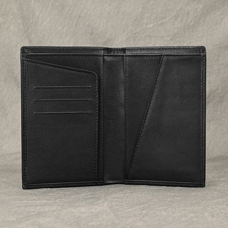 Premium black leather passport wallet with multiple compartments and slots for secure storage and organisation