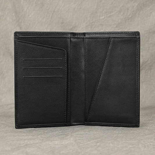 Premium black leather passport wallet with multiple compartments and slots for secure storage and organisation