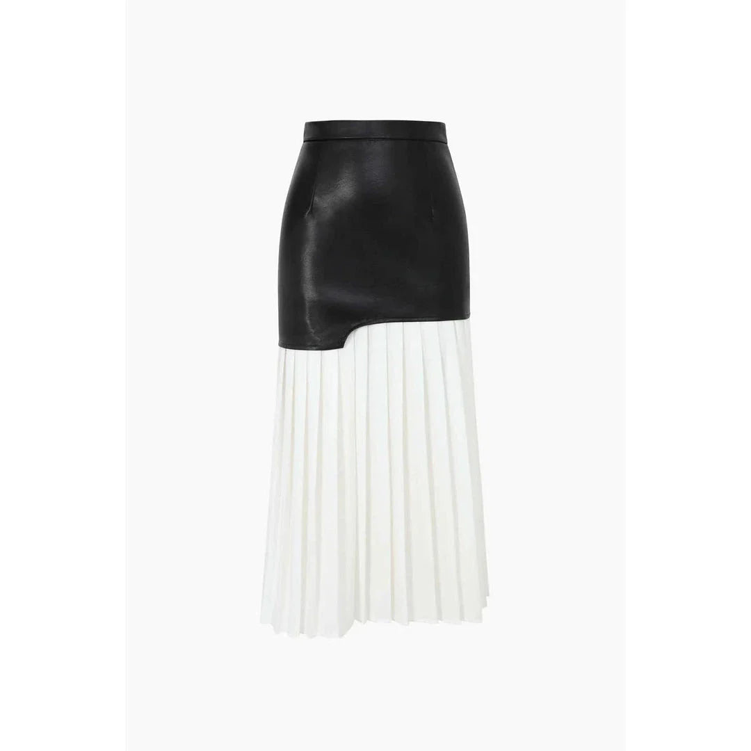 A stylish long pleated skirt featuring a sophisticated leather patchwork design and a flattering A-line silhouette