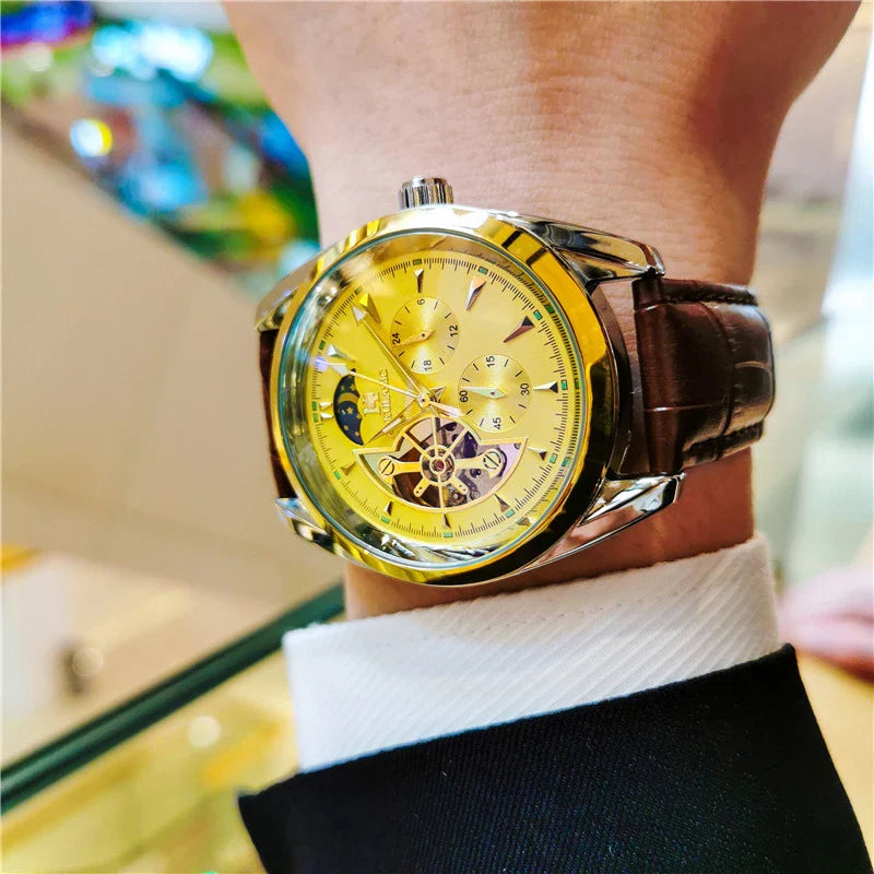 Elegant men's automatic mechanical watch with exquisite hollowed-out design, featuring luminous hands, moon phase display, and small seconds subdial.