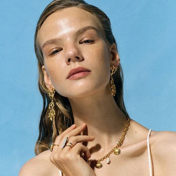 Elegant 18K gold plated coral pearl pendant earrings with a secure stud closure and a tarnish-proof finish