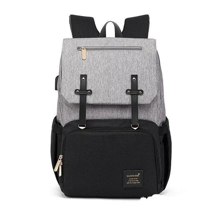 A stylish and practical mummy backpack with multiple pockets, perfect for organising and transporting all your parenting essentials.