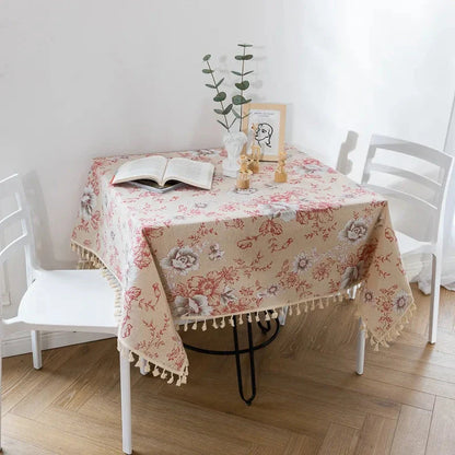 Elegant peony print cotton linen tablecloth with tassels, perfect for sophisticated home decor and dining experiences