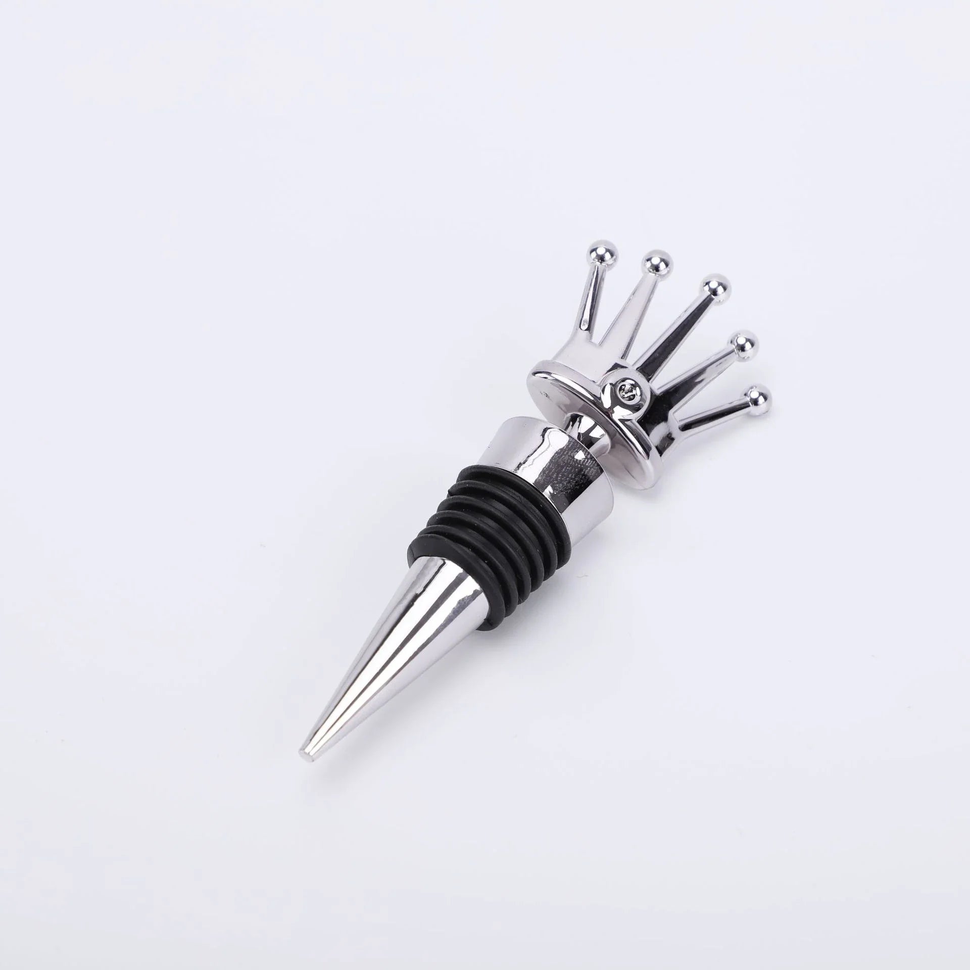 Elegant wine stopper with regal crown design, perfect for preserving wine freshness and adding sophisticated style to your kitchen or dining room.