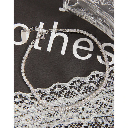 Sparkling silver geometric bracelet with adjustable clasp and intricate patterns