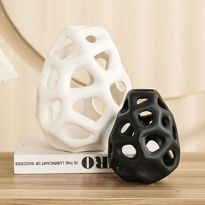 Stylish ceramic decorative balls in geometric design, available in white and black, small and large sizes, for modern home decor