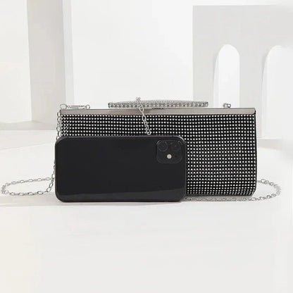 Glamorous gold rhinestone evening clutch with elegant chain and diamond decorations, perfect for UK special occasions