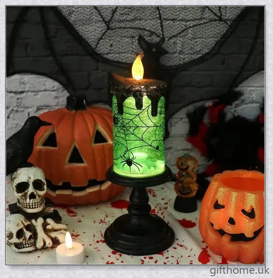 Candlite 10-inch Grand Glittering Halloween LED Candles with intricate designs of spiders, skulls, and other spooky elements