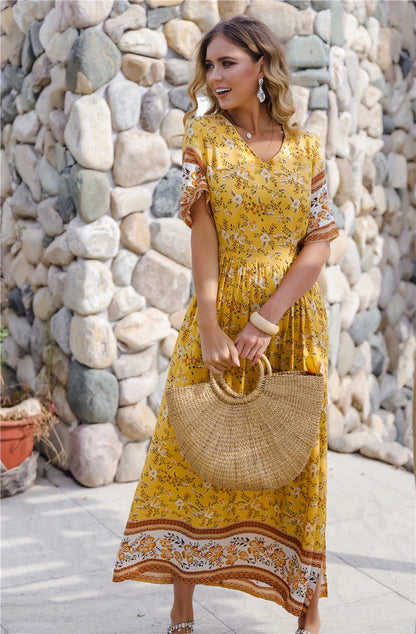 Elegant long dress with floral print design, perfect for coastal-inspired fashion