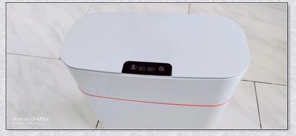 Sensor-powered bin with sleek design and touch-free motion-activated lid for effortless, hygienic waste disposal