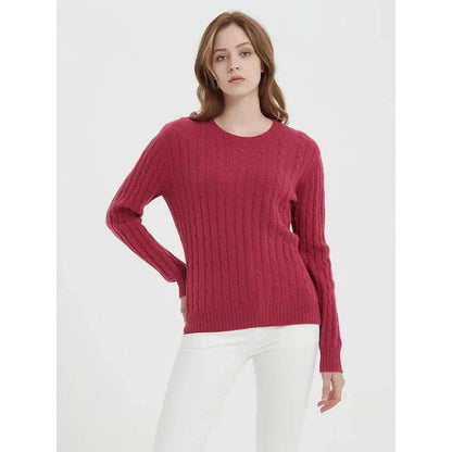 A luxurious 100% British wool cable knit jumper in a rich camel colour, perfect for keeping warm during the UK's chilly winters.