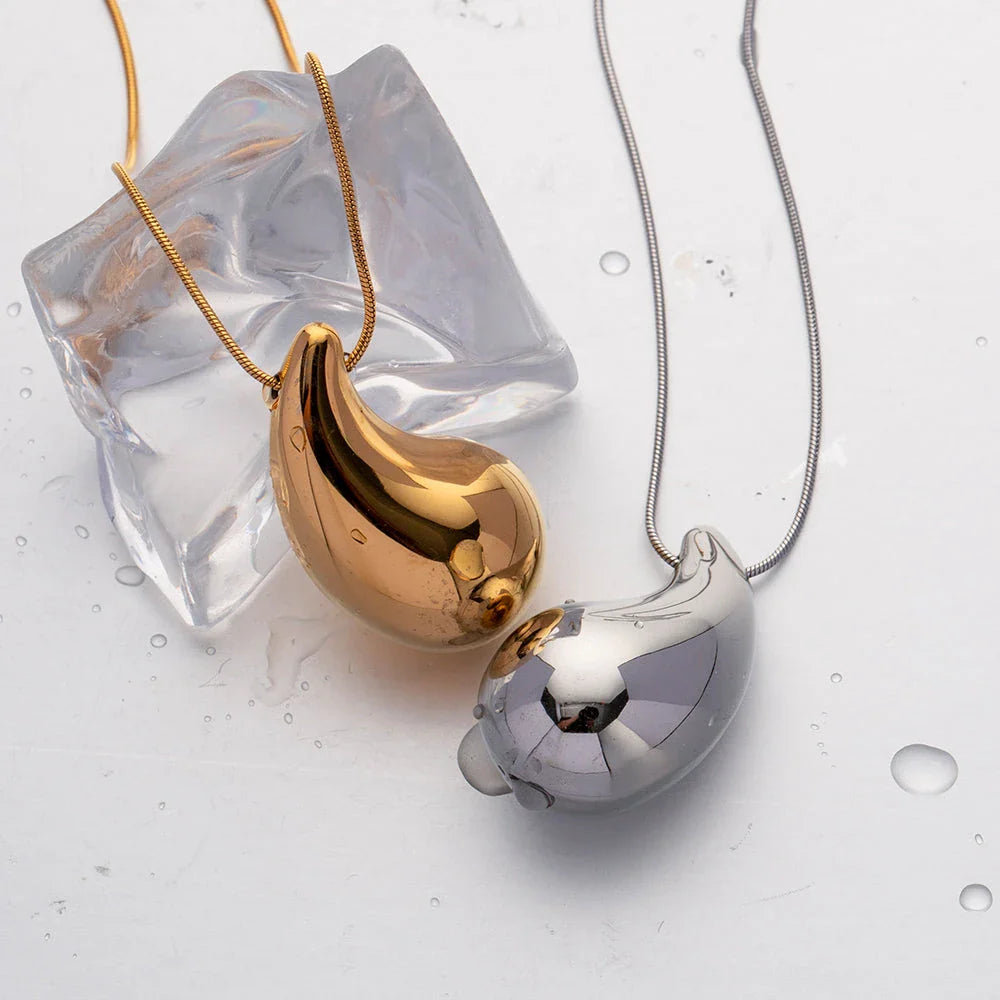 Elegant gold-plated stainless steel necklace with a large, sparkling waterdrop-shaped pendant