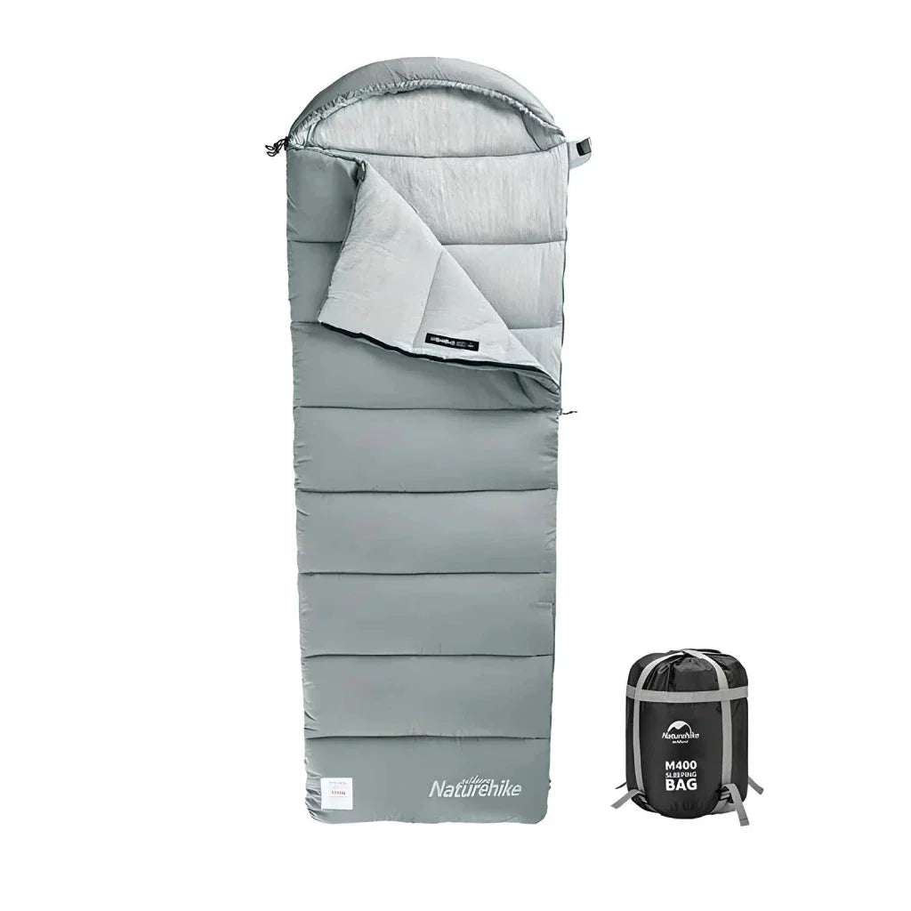 Premium lightweight double camping sleeping bag with cotton filling and terylene fabric, suitable for spring and autumn camping trips in the UK.