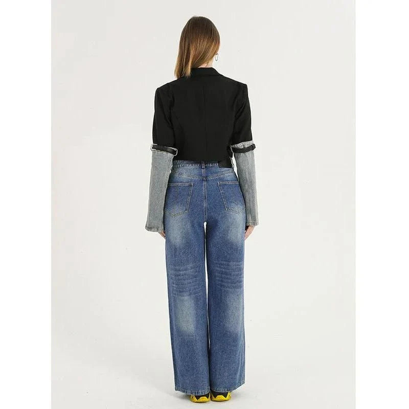 A stylish denim patchwork blazer with a notched collar and single-button closure, designed for the modern British woman