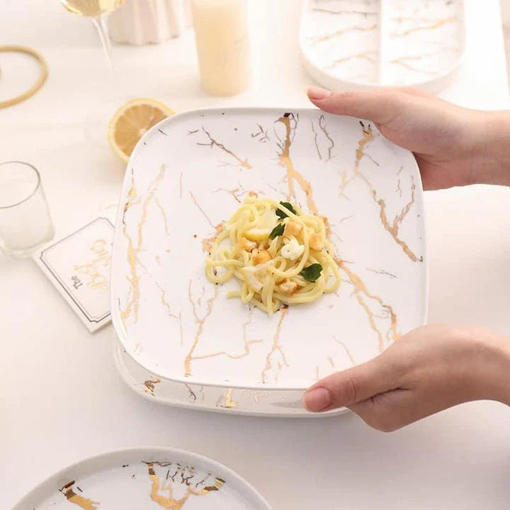 Elegant marble-inspired ceramic plate with a refined and sophisticated design, perfect for elevated dining experiences.