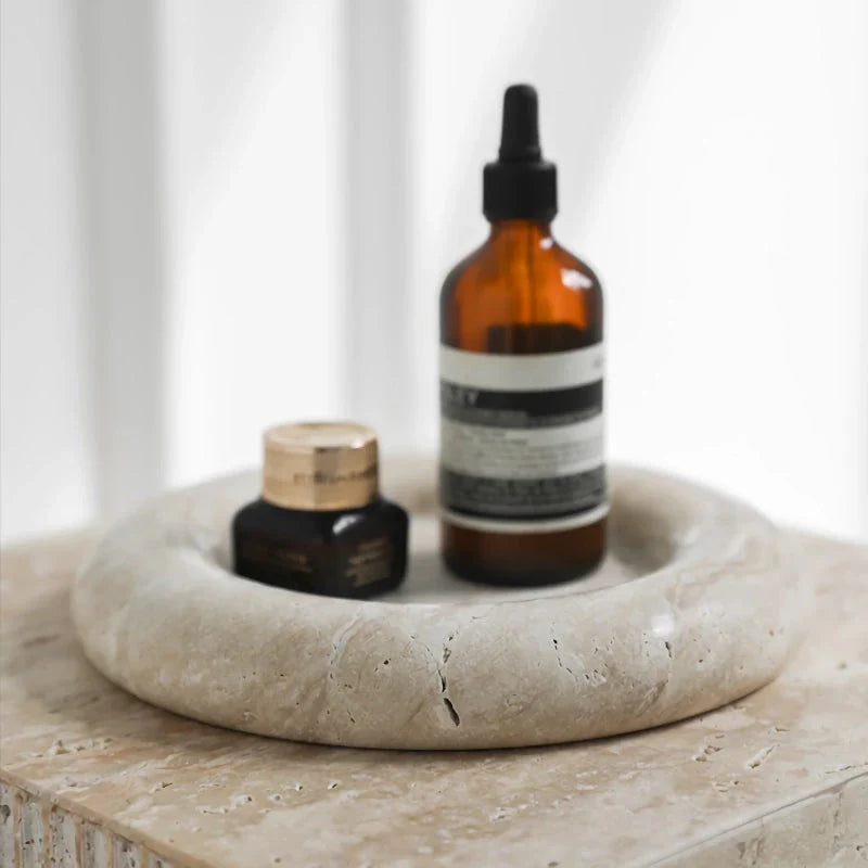 Elegant travertine serving tray with a smooth, round design and neutral beige colour for versatile home decor use