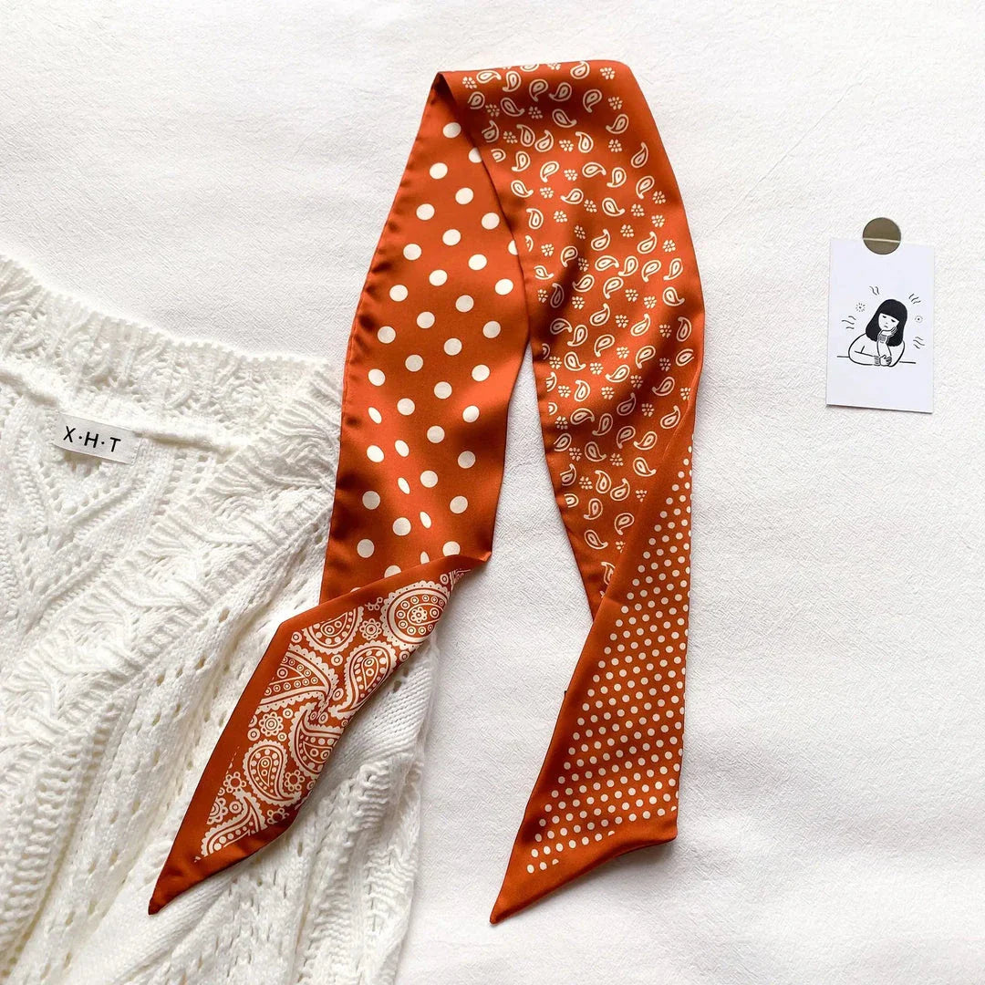 Luxury silk-feel narrow scarf in blue colour, a versatile fashion accessory for the modern British woman