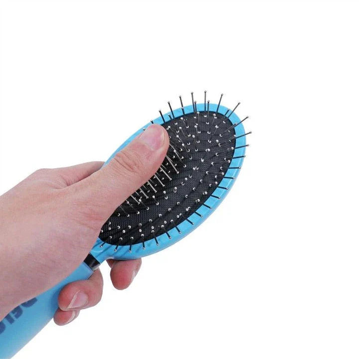 Dual-sided pet grooming and massage brush with soft bristles and metal pins for effective coat care and relaxation