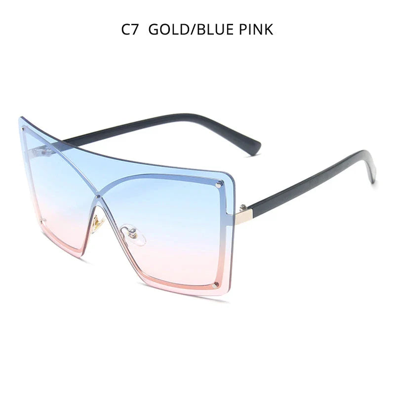 Fashionable oversized flat top sunglasses with gradient lenses and a sleek, rimless plastic frame