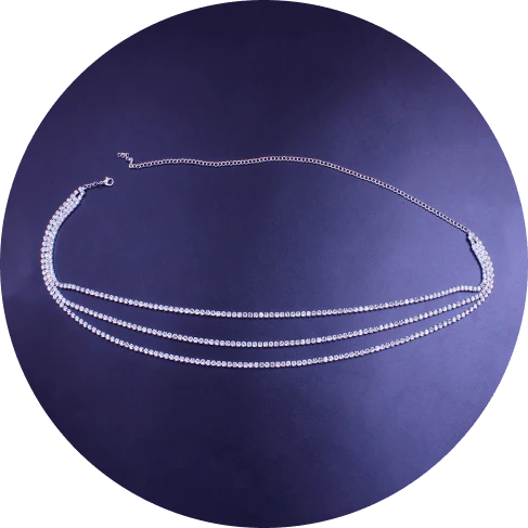 Elegant multilayered brass waist chain adorned with shimmering rhinestones and swinging heart pendants