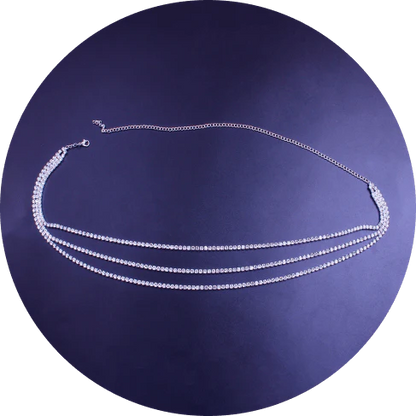 Elegant multilayered brass waist chain adorned with shimmering rhinestones and swinging heart pendants