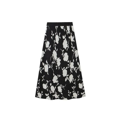Elegant floral jacquard knit skirt in a mid-calf length with a flattering A-line silhouette