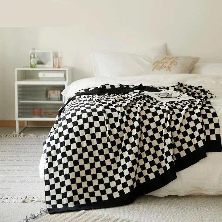 Cosy tartan check cotton knit throw blanket in earthy tones for stylish home decor