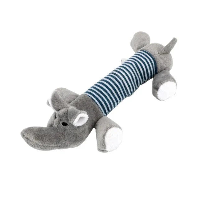 Premium plush squeaky dog toy in various colours, featuring textured stripes for dental cleaning and a built-in sound generator for interactive play.