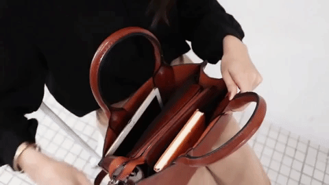 Premium leather tote bag in various colours, featuring a spacious interior, adjustable shoulder strap, and durable PU leather construction
