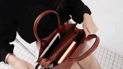 Premium leather tote bag in various colours, featuring a spacious interior, adjustable shoulder strap, and durable PU leather construction