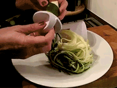 Premium Handheld Vegetable Spiralizer with 2-in-1 design for creating wide or thin noodle strips from various vegetables