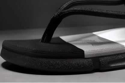 A pair of versatile 2-in-1 lightweight and durable sandals/flip-flops in black, army green, and dark blue colours
