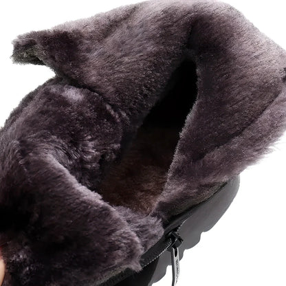 Elegant women's winter boots with warm faux fur lining, durable rubber sole, and sleek, versatile design