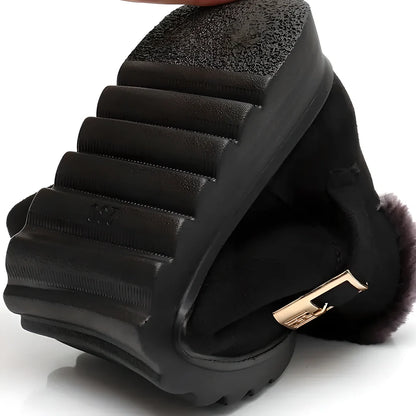 Elegant women's winter boots with warm faux fur lining, durable rubber sole, and sleek, versatile design