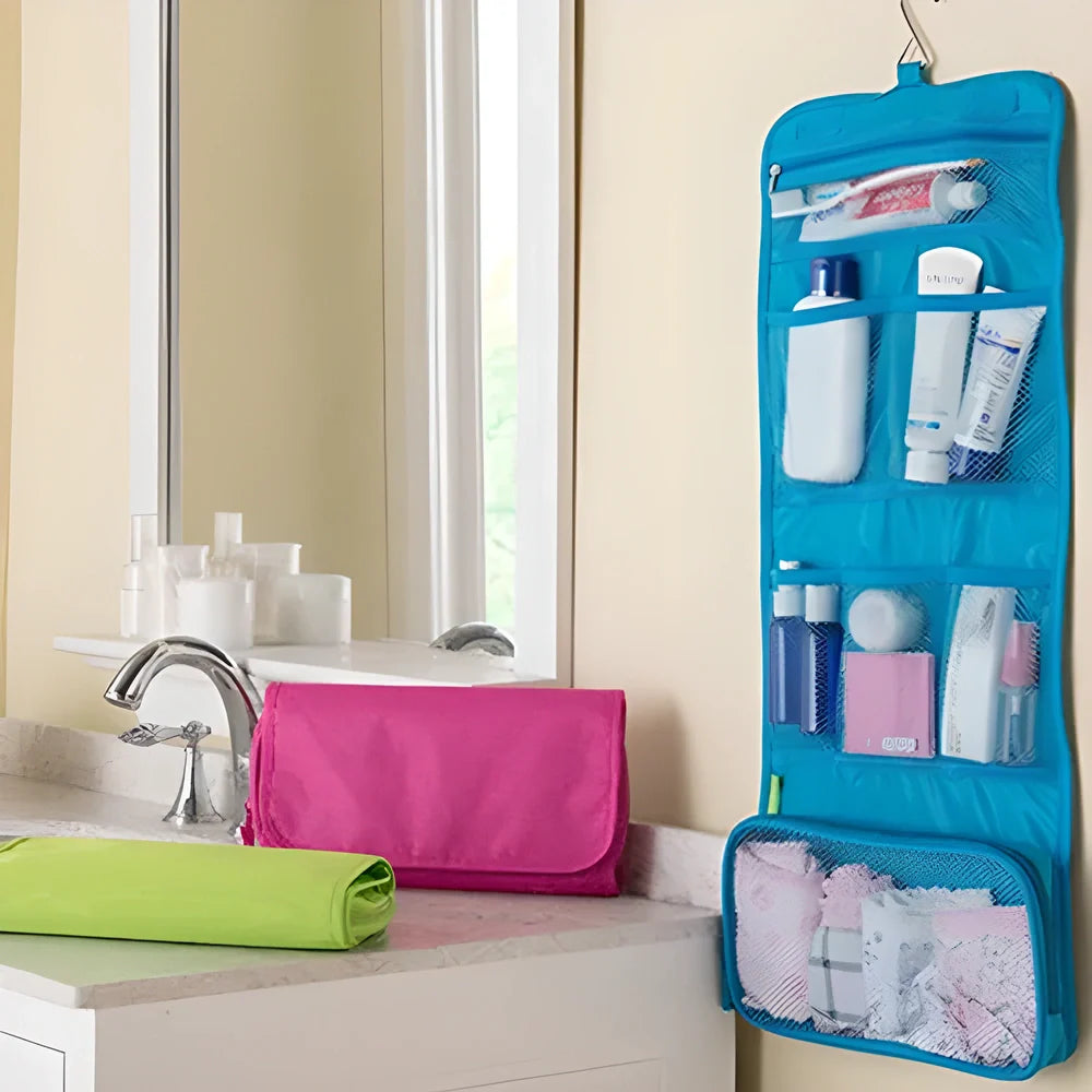 A folding travel toiletry organiser made of polyester, available in red, blue, and green colours