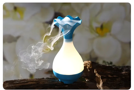 Ultrasonic aroma diffuser and humidifier with dimmed yellow light, creating a calming and relaxing atmosphere