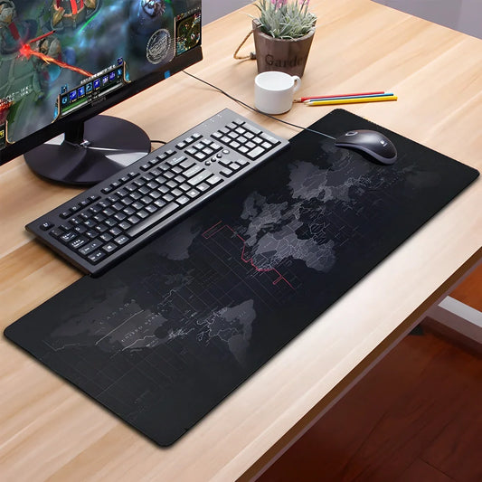 Expansive world map printed on a large, comfortable mouse pad with anti-slip rubber base, perfect for desks in the UK